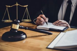 Sex Crimes Lawyer Utah- lawyer writing document