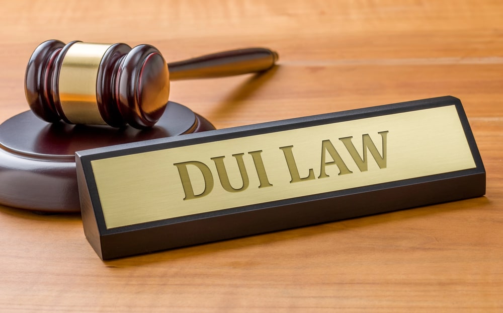 Utah DUI lawyer reviewing case details with a client